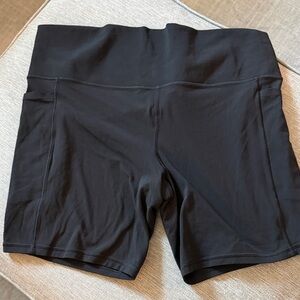 Athleta Black High-Rise Bike Shorts with Side Pockets